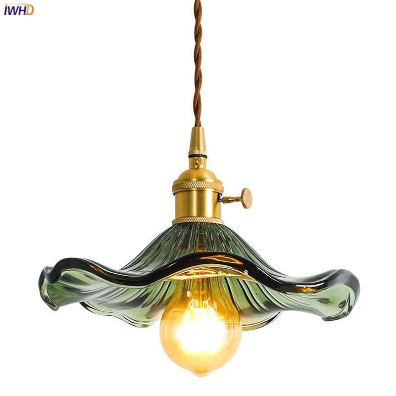Nordic LED pendant lamp, clear glass & copper. Versatile modern lighting for any room.