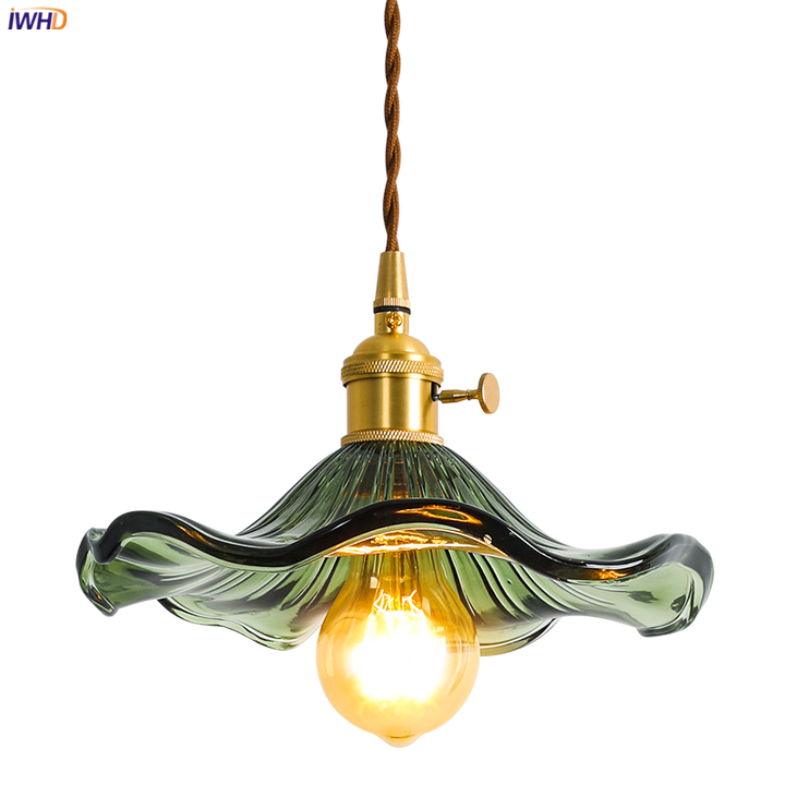 Nordic LED pendant lamp, clear glass & copper. Versatile modern lighting for any room.