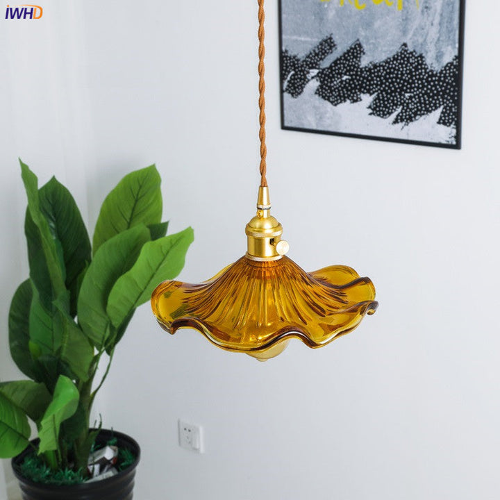 Chic Nordic LED hanging light, amber glass & copper. Adds warmth to a dining area or kitchen.