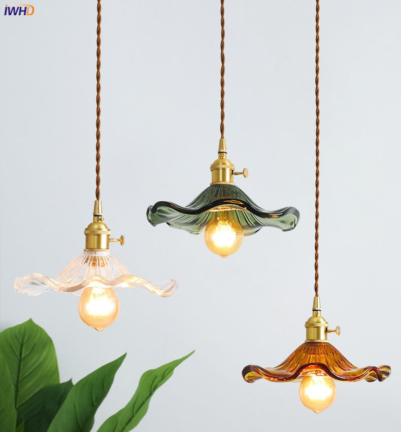 Contemporary glass & copper LED hanging light. Nordic design for a stylish bar area.