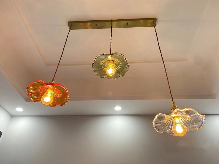 Elegant Nordic LED ceiling lamp with smoky glass & copper. Perfect for a minimalist bedroom.
