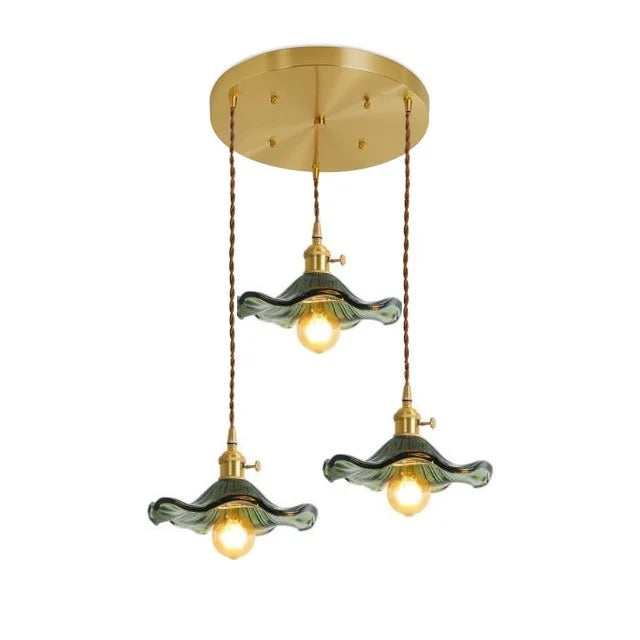 Modern Nordic LED hanging lamp, green glass & copper. Adds a fresh touch to any room.