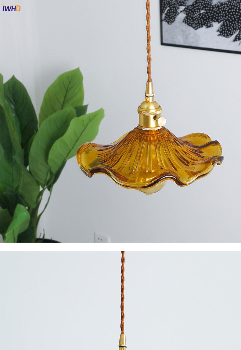 Stylish Nordic LED pendant, clear glass shade & copper body. Modern lighting for kitchen island.