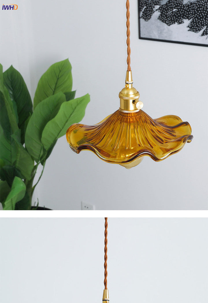 Stylish Nordic LED pendant, clear glass shade & copper body. Modern lighting for kitchen island.