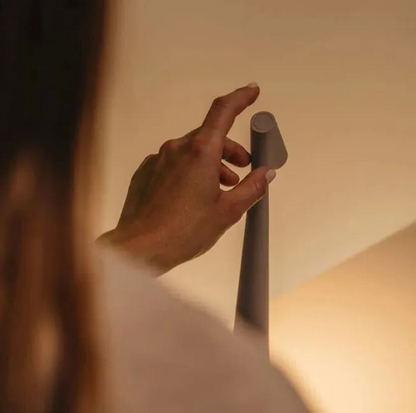 Sleek Nordic wireless LED reading lamp. Portable modern design, perfect for comfortable evening ambiance.