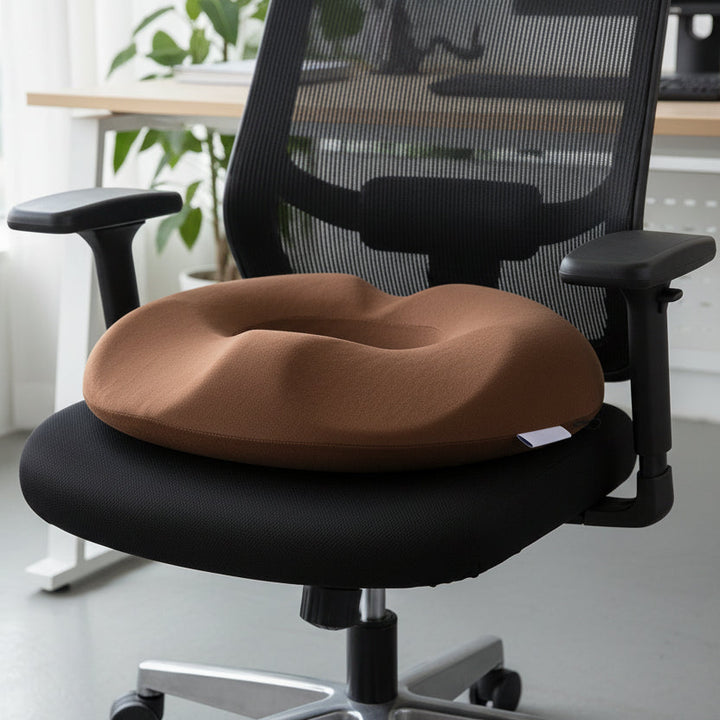 Orthopedic memory foam seat cushion for tailbone & back pain relief, promoting ergonomic posture.