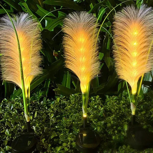 Weather-resistant decorative reed solar lights for year-round garden lighting and ambiance.