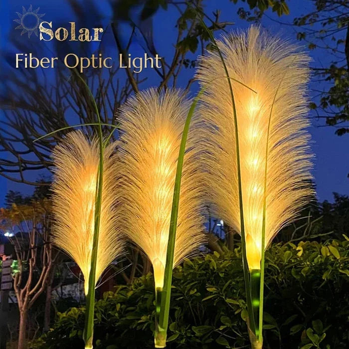Close-up of solar reed garden light with a warm glow, perfect for outdoor decorative lighting.