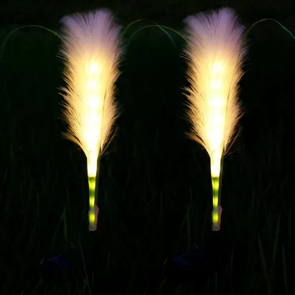 Detailed view of a decorative reed solar light, showcasing its natural texture and LED glow.