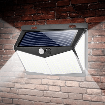 Outdoor solar motion sensor LED security flood light for home protection. Bright, energy-efficient exterior lighting.