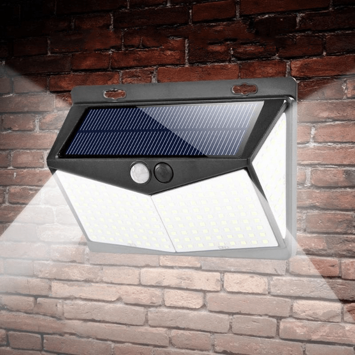 Outdoor solar motion sensor LED security flood light for home protection. Bright, energy-efficient exterior lighting.