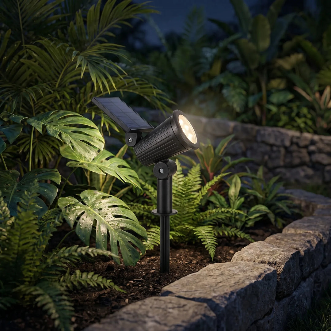 Outdoor solar powered adjustable LED spotlight for garden and landscape lighting.