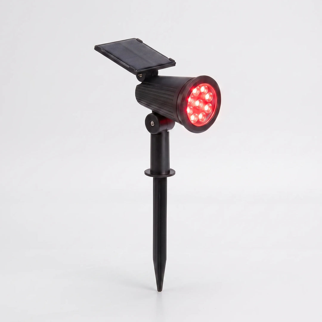 Adjustable solar LED spot light for outdoor landscape, garden, or pathway illumination.