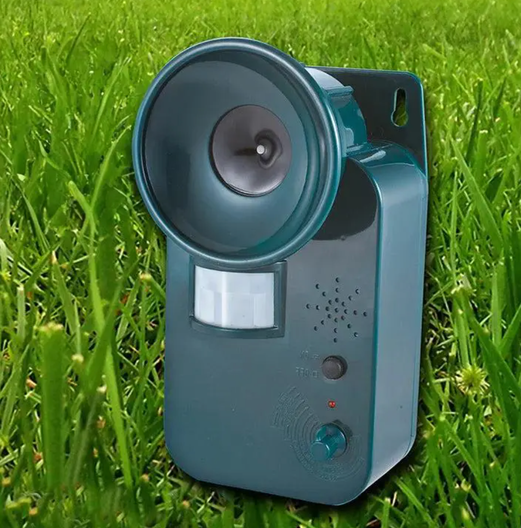 Outdoor ultrasonic pest repeller, cordless & weatherproof for effective garden & yard security.