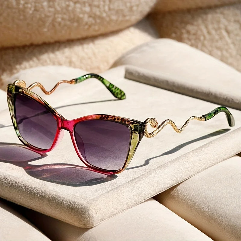 Premium women's oversized cat-eye sunglasses, full UV protection, elaborate snake arms.