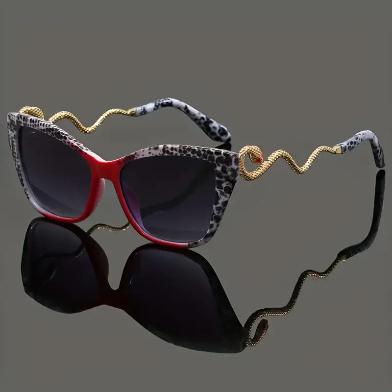 Elegant oversized cat-eye sunglasses for women, dark gradient lenses, snake arm.