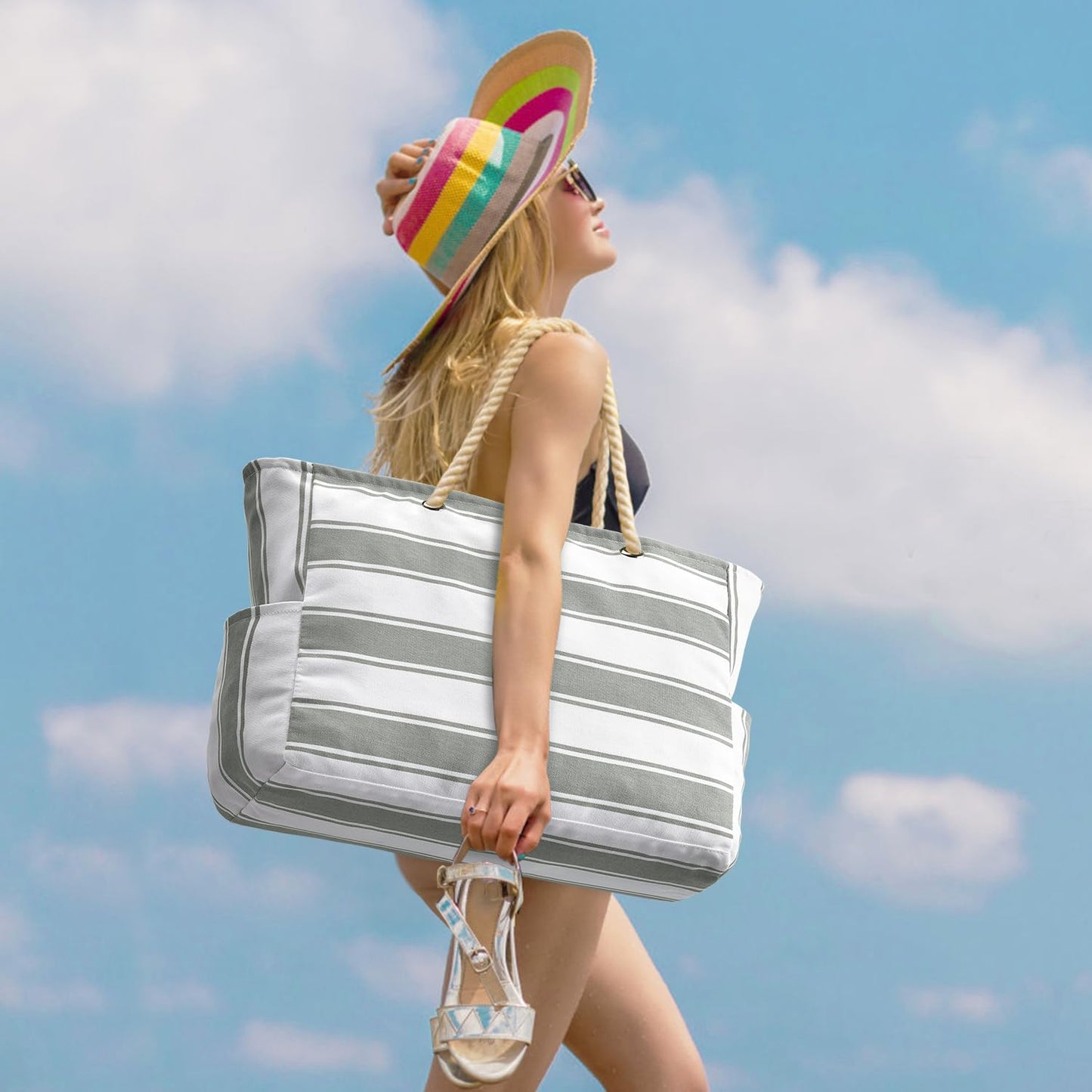 Oversized waterproof women's tote bag, sandproof and durable for beach adventures.