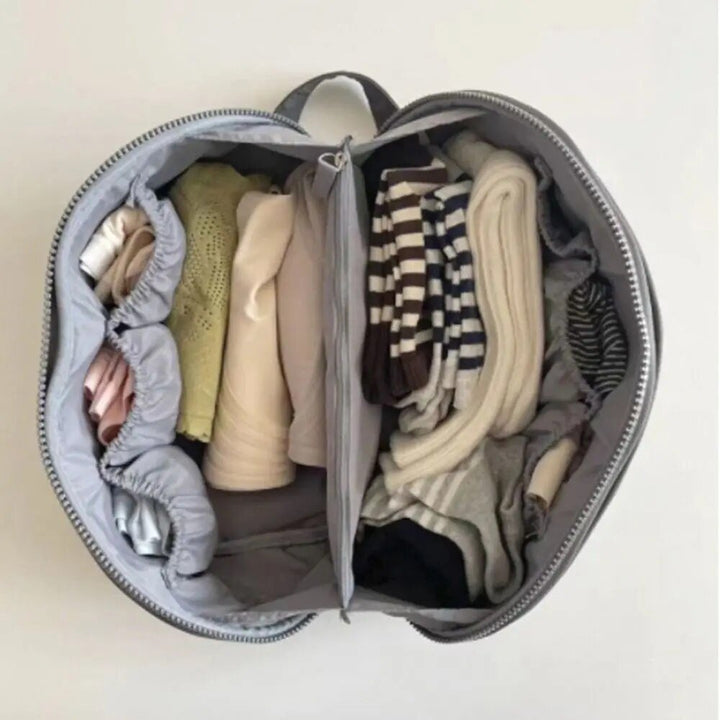 Unisex travel wash bag by Packify. An efficient packing solution & cosmetic organizer for your next trip.