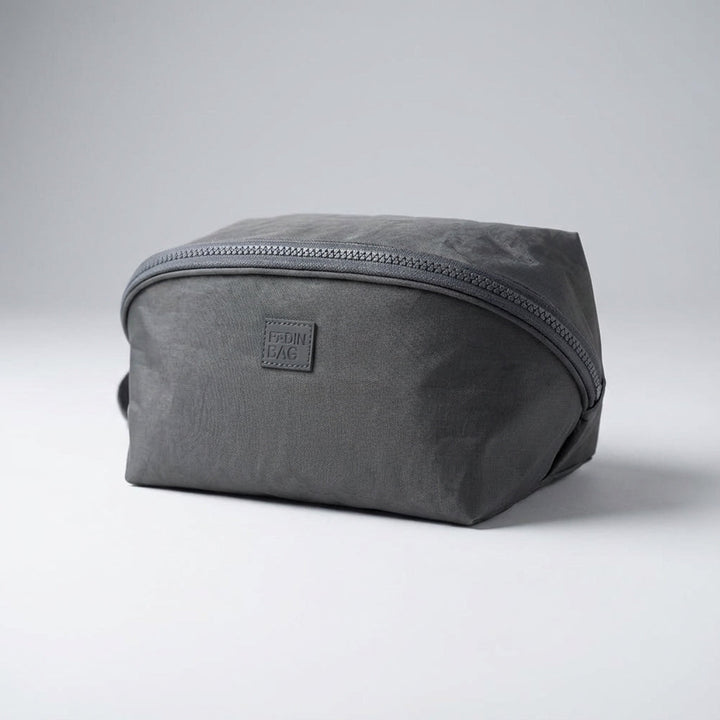 Unisex travel essentials bag. Packify toiletry organizer, ideal as a wash bag, cosmetic bag, or travel pouch.