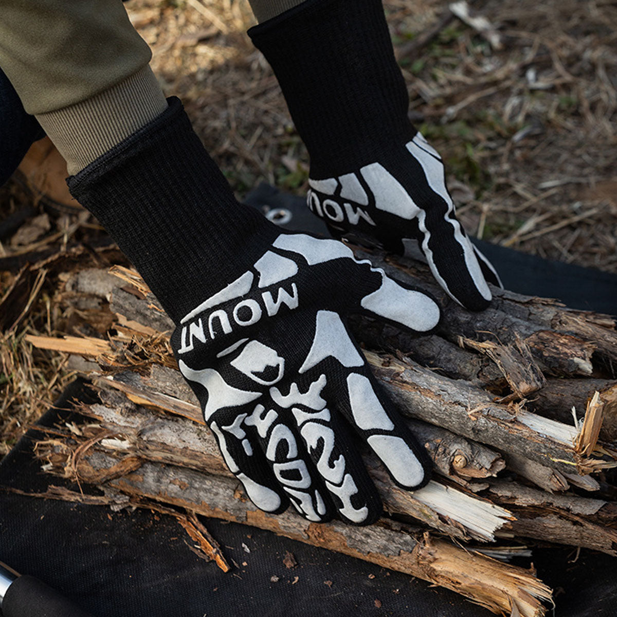 Protective heat resistant BBQ gloves with textured non-slip surface, essential outdoor gear