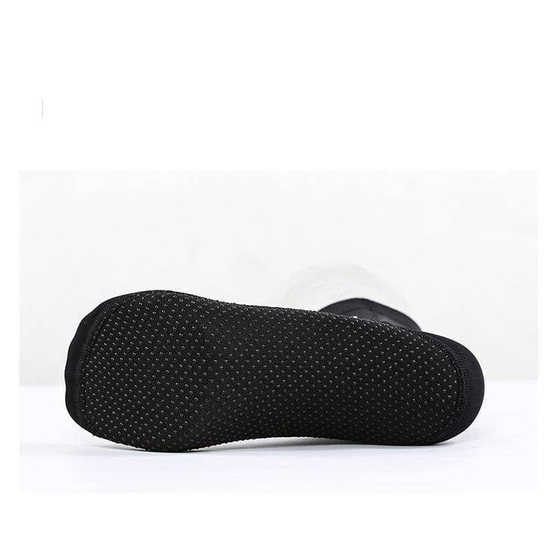 Close-up of the textured anti-slip sole on a neoprene diving water sock, offering secure grip for swimwear.