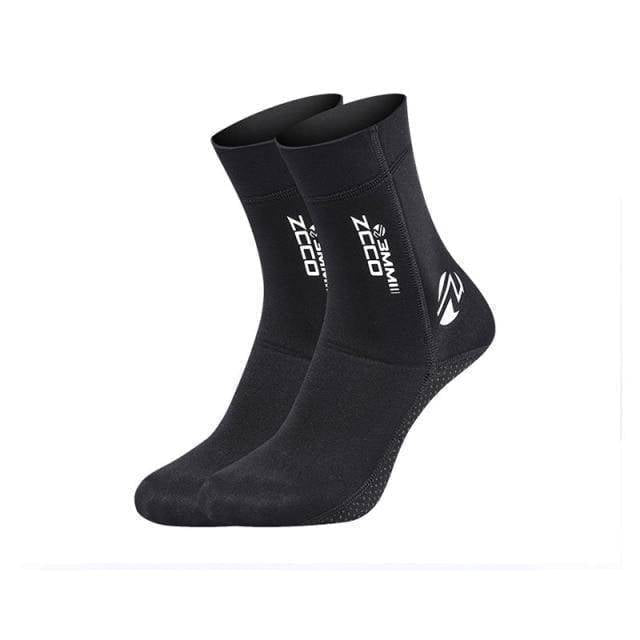 Model wearing black anti-slip neoprene diving socks on a wet surface, showcasing their use in water sports.
