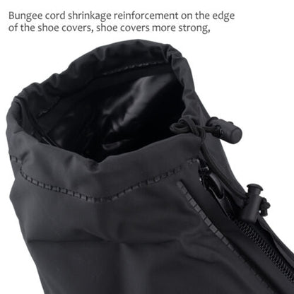Person wearing black reusable waterproof shoe covers walking in the rain.