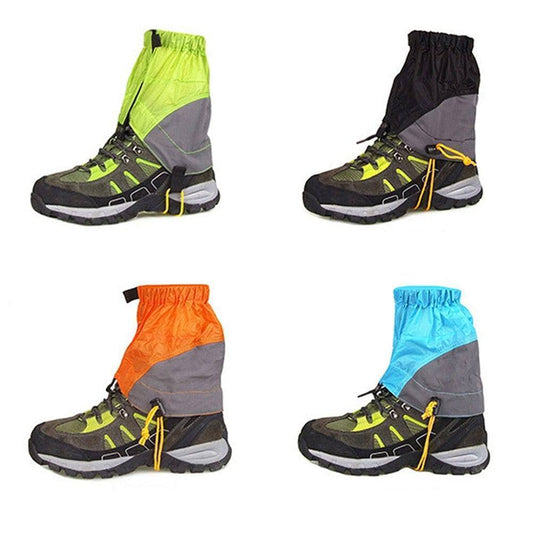 Pair of black waterproof hiking gaiters for leg protection in snow, ideal for outdoor running & trekking.