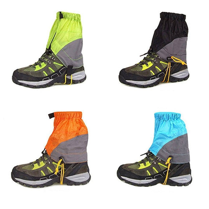 Pair of black waterproof hiking gaiters for leg protection in snow, ideal for outdoor running & trekking.