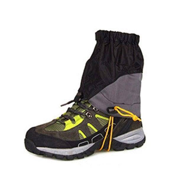 Detail of waterproof zipper and hook on outdoor gaiters, ensuring snow and debris stay out during trekking.