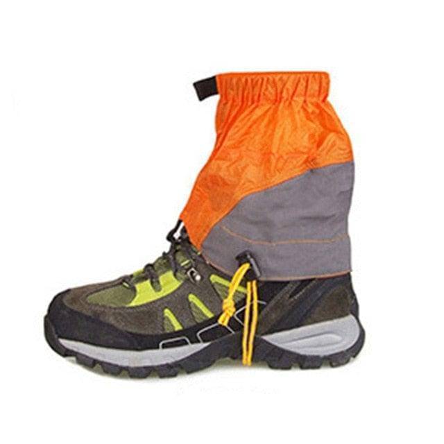 Pair of lightweight hiking gaiters in an alpine snow environment, providing essential leg protection.