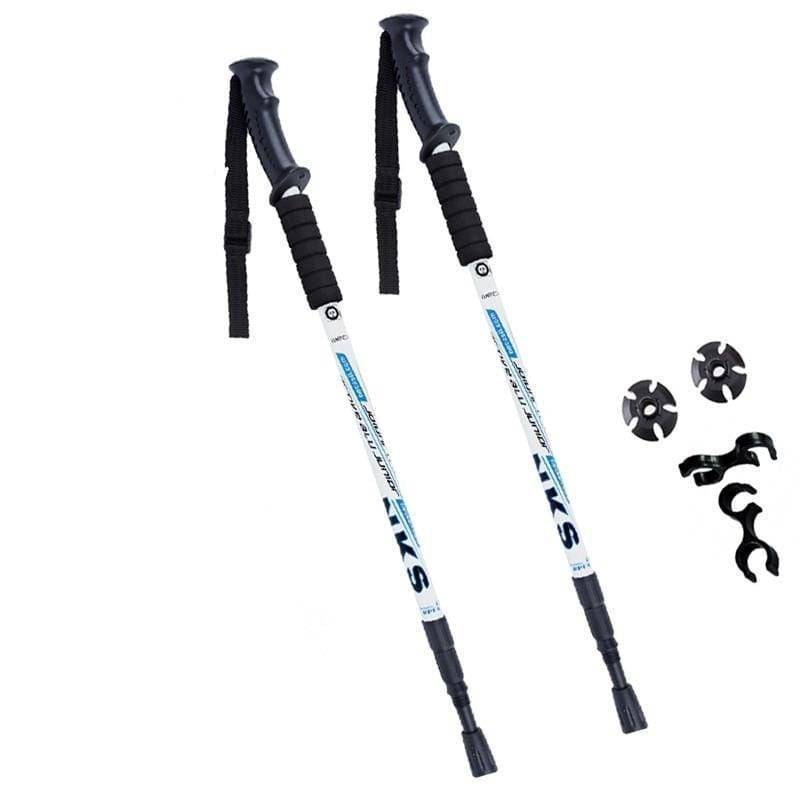 Pair of silver unisex anti-shock trekking poles for hiking, adjustable aluminum with ergonomic black grips.
