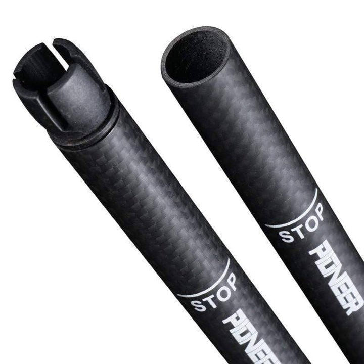 Compact folded carbon fiber trekking pole with quick-lock system, outdoor adventure ready.