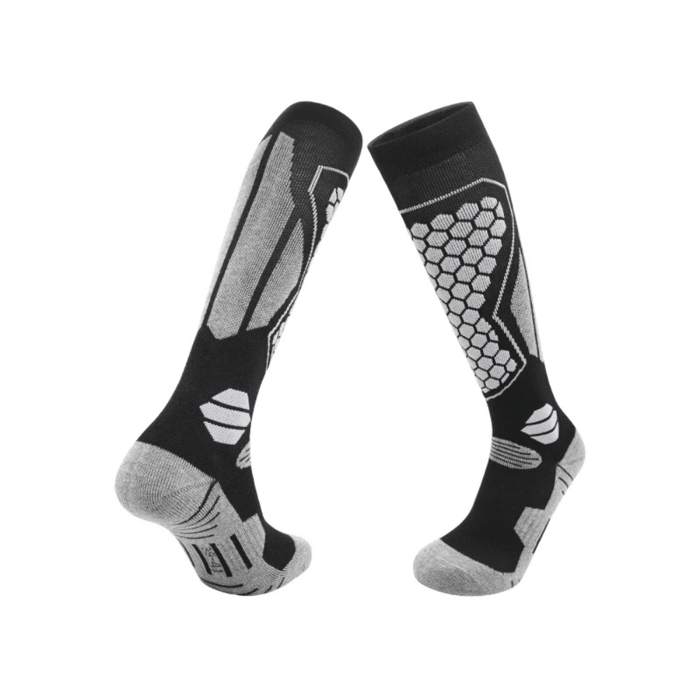 Pair of unisex thermal winter ski socks, black with grey accents, on a white background