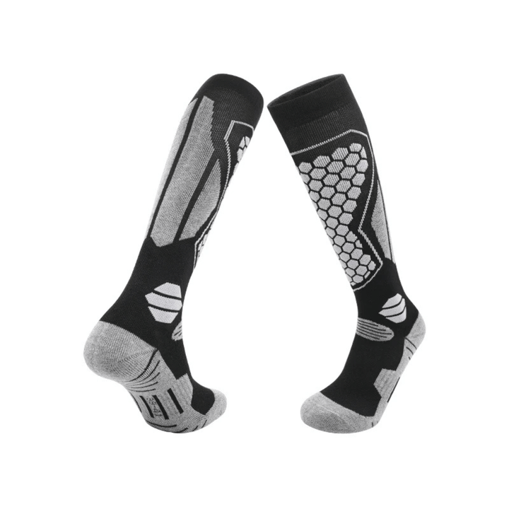 Pair of unisex thermal winter ski socks, black with grey accents, on a white background