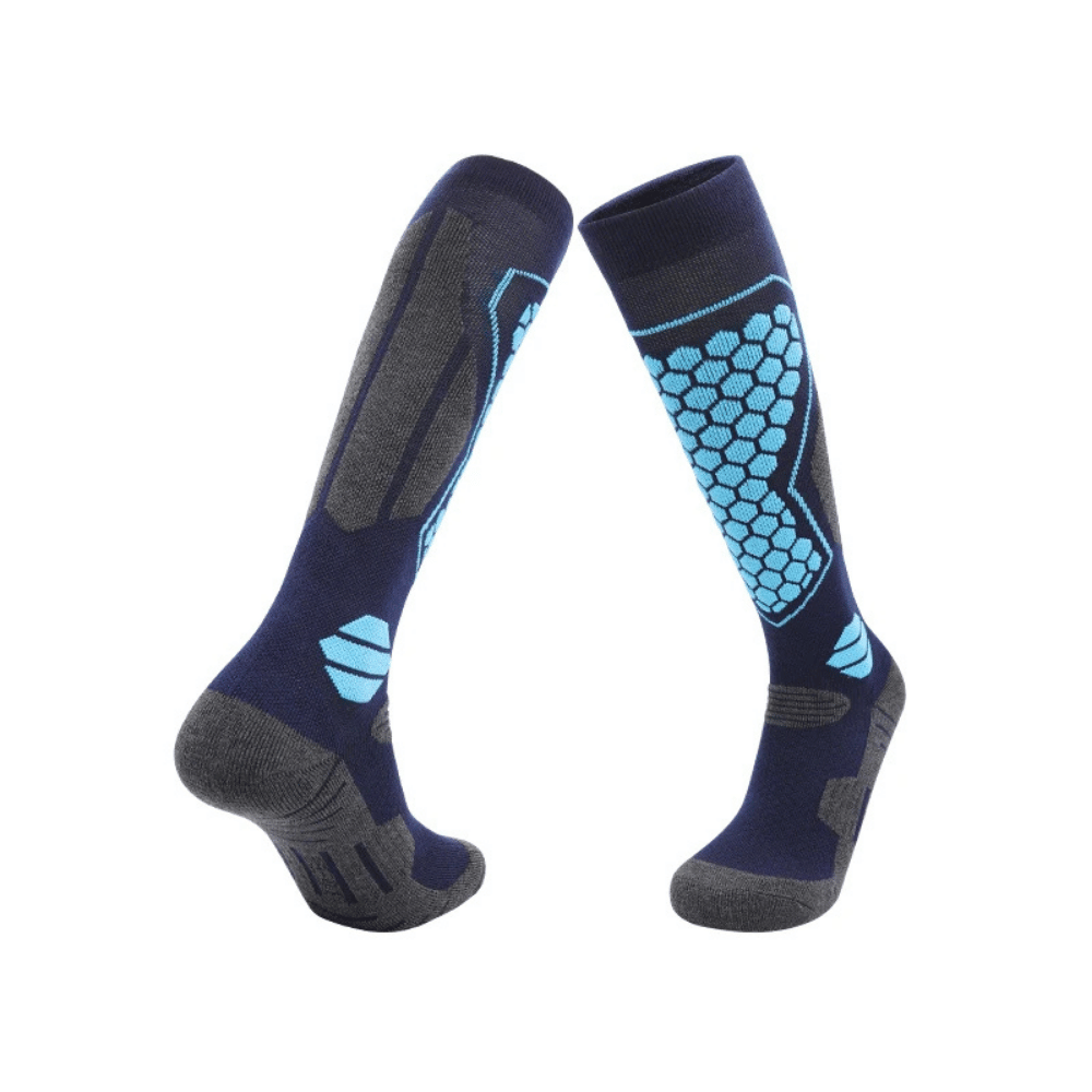 Detailed view of the cuff of a black thermal ski sock, ensuring a secure fit