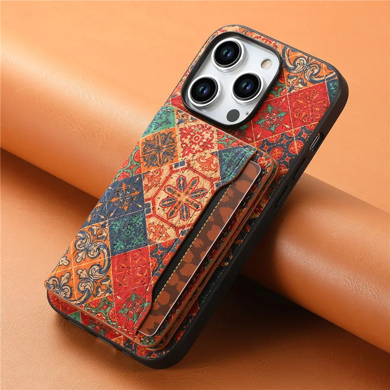 Protective patterned iPhone wallet case in vegan leather, featuring a built-in kickstand.