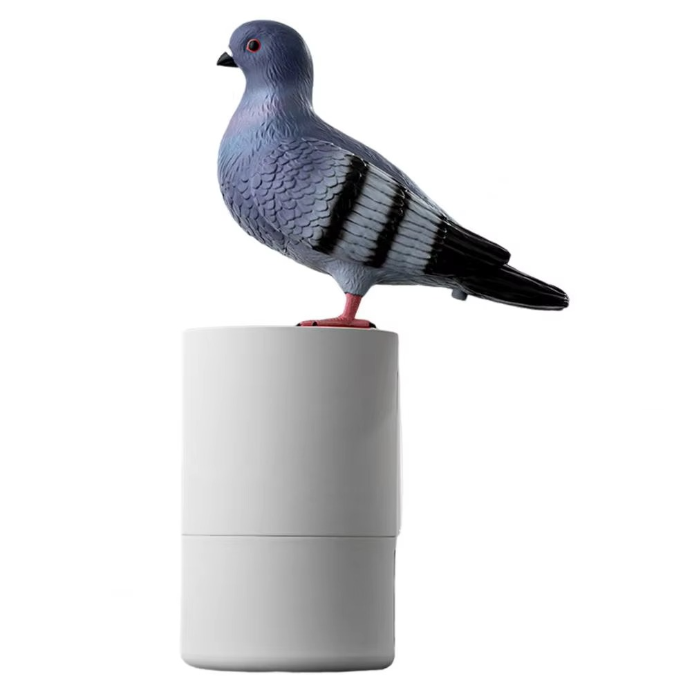 Hand approaching Pigeon automatic touchless foam soap dispenser, showing sensor activation for hygienic use.