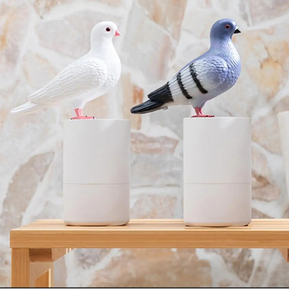 Sleek white and gray Pigeon touchless foam soap dispenser, a modern decorative piece for home and office decor.