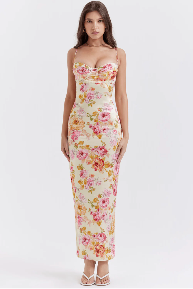Flowy floral maxi wedding guest dress with a flattering corset top, a beautiful and elegant slip dress.