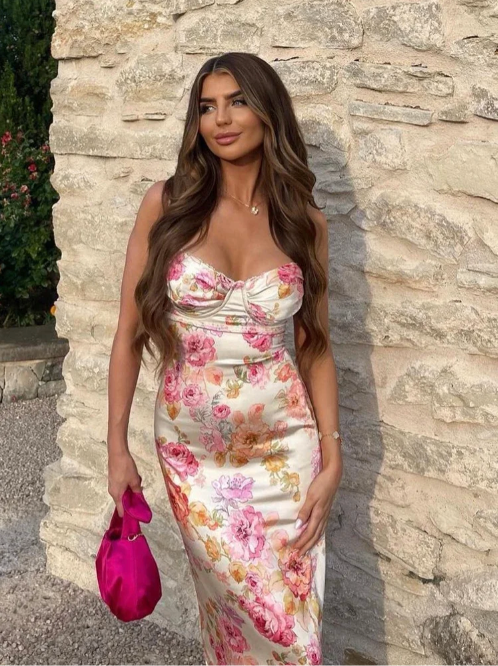 Women's summer floral maxi slip dress, featuring a gorgeous corset detail, ideal as a romantic wedding guest attire.
