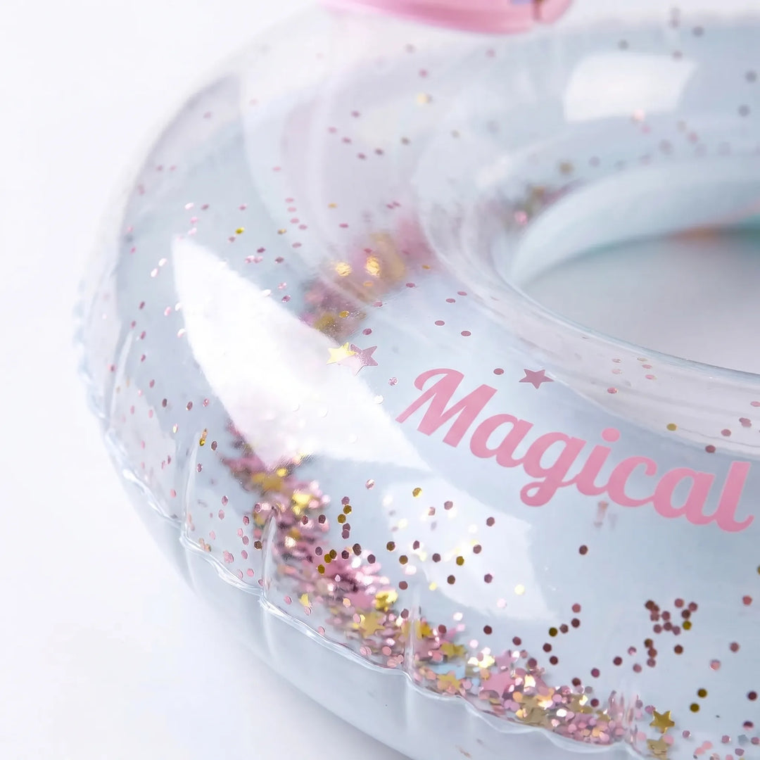 Giant pink unicorn inflatable pool float with shimmering wings. Ideal summer lounger for swimming pool parties.