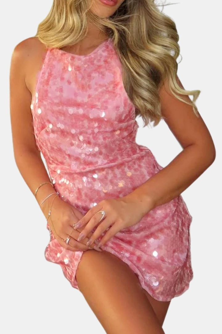 Women's pink sequin halter homecoming dress. Elegant bodycon mini style, perfect for dancing & special occasions.