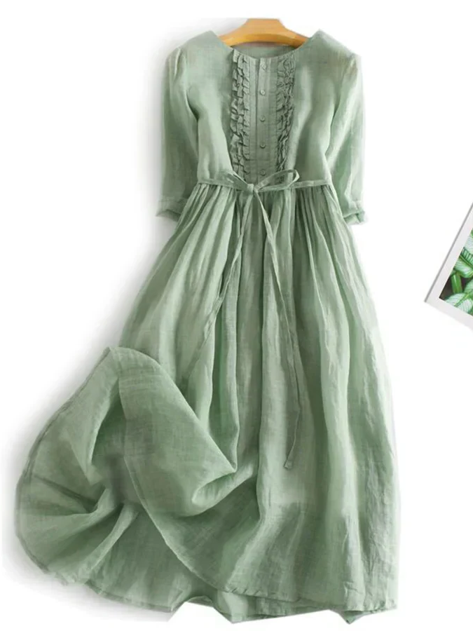 White elegant Ruffle Midi Dress for women, a comfortable summer dress perfect for beach wear or vacation.