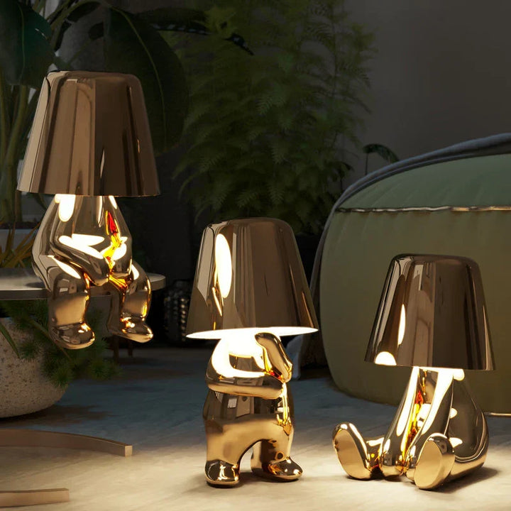 Modern LED table lamp, playful design, dimmable for ambient lighting.