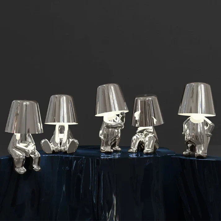 Rechargeable LED table lamp, playful aesthetic, offers dimmable mood lighting.