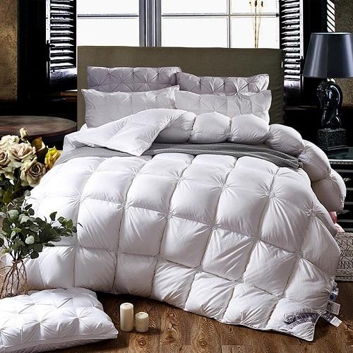 PlumeLux piped goose down duvet, providing superior warmth & luxurious comfort for your bedroom.