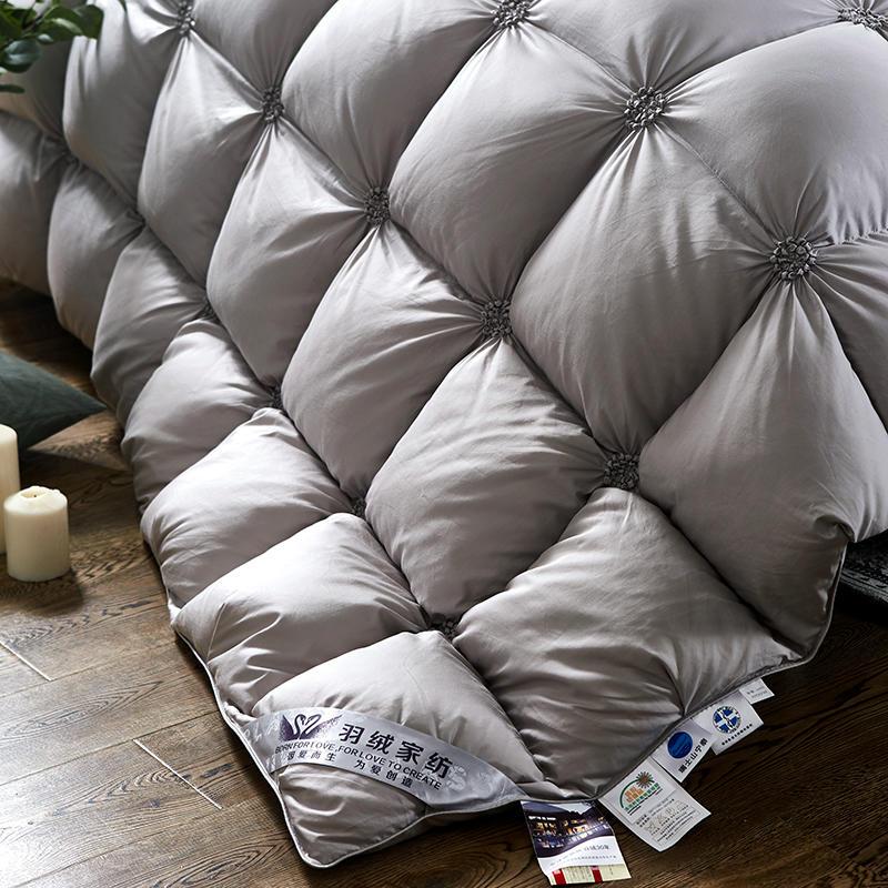 Premium 100% goose down duvet, soft & warm, enhancing your luxury bedding & home comfort.
