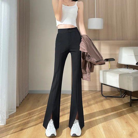 Plus size black flared pants for women with stylish front slits. Elegant & comfortable for all-year fashion.
