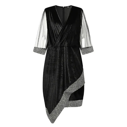 Glamorous plus-size fall fashion dress. Elegant long sleeve design with sophisticated sheer details.